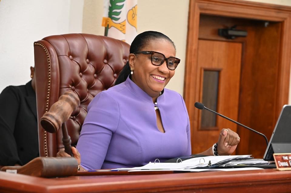 Senator Donna Frett-Gregory reviewing documents on the floor of the Legislature of the United States Virgin Islands